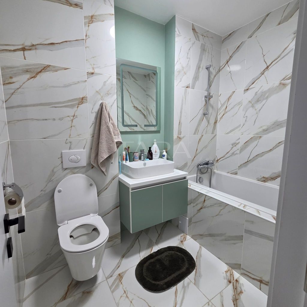 Apartament modern cu 3 camere, balcon generos și parcare subterană. - Poză 6