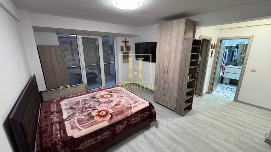 Apartament 1 camera Dec 38 mp Bucium 66500 euro. - Poză 5