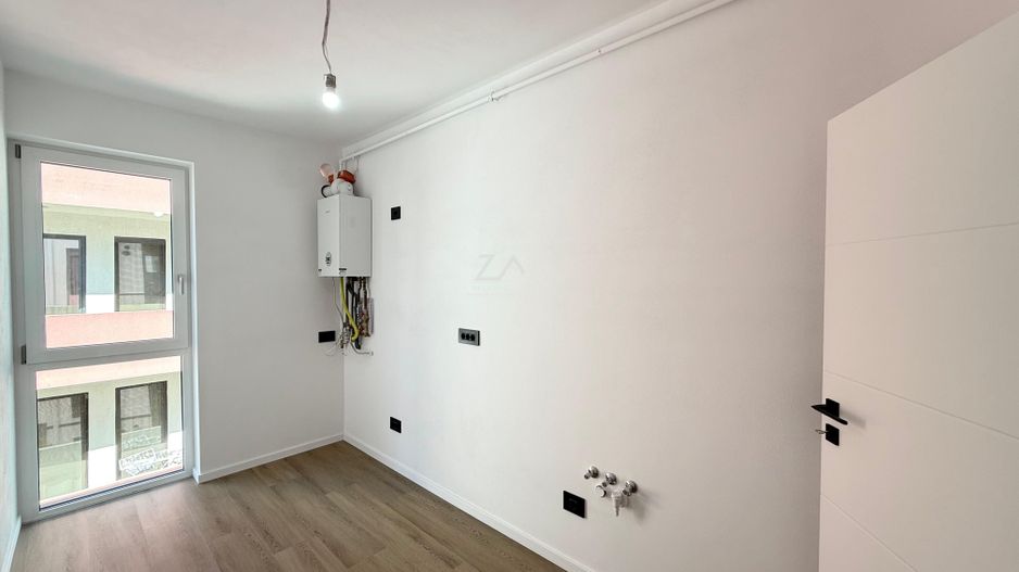 Ap pe 2 niveluri. Bucatarie inchisa, 2 bai. 2 locuri de parcare. - Poză 4