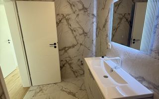 Apartament cu 2 camere, finisat modern, central Floresti. - Poză 5