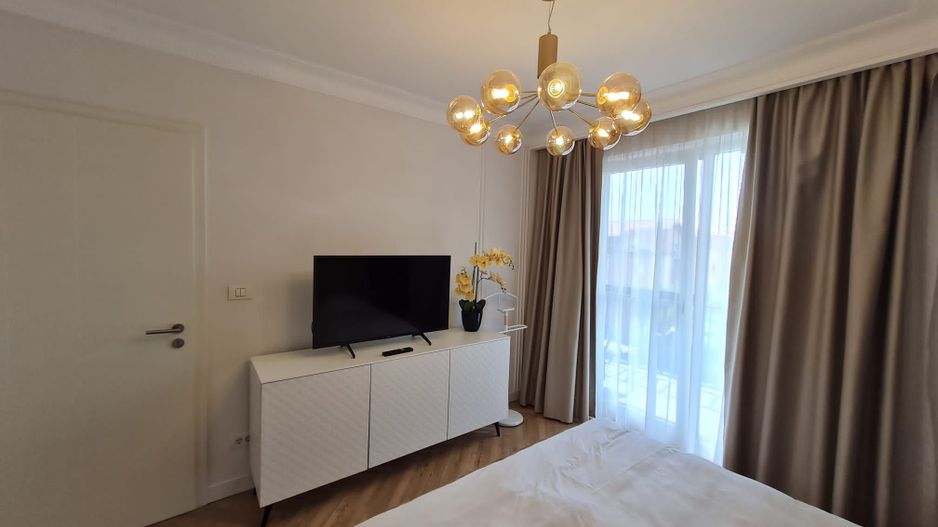 Elegantă și prestanță - Poză 14