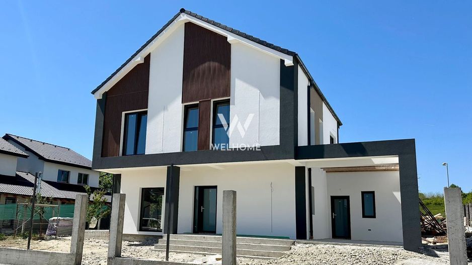 Casă single modernă, eficientă energetic și curte generoasă - Poză 1