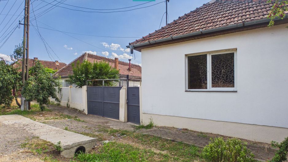 Casă cu 2 camere și 1000 mp teren în Păuliș - Poză 10