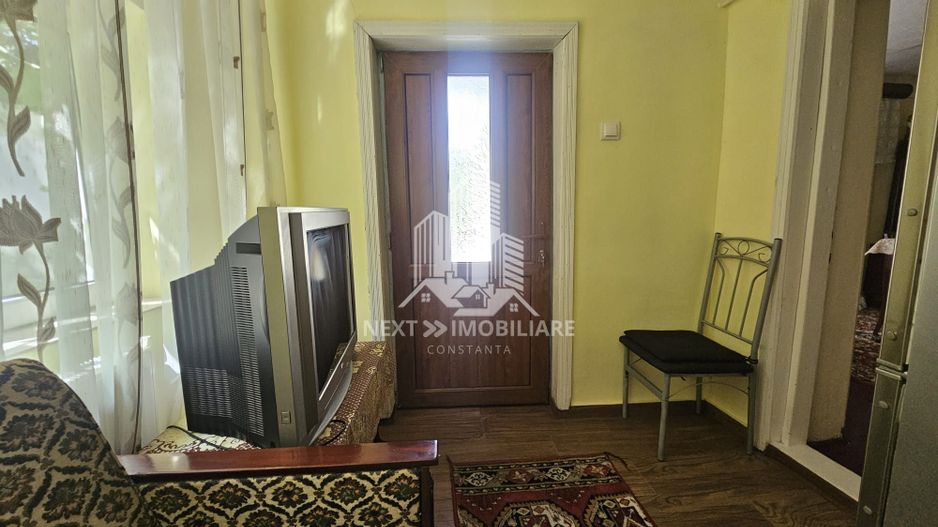 Casă  4 camere cu 2 intrări, garaj și teren 1751mp– Cobadin - Poză 6