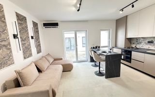Apartament mobilat cu designer cu 2 camere si gradina in Braytim - Poză 1