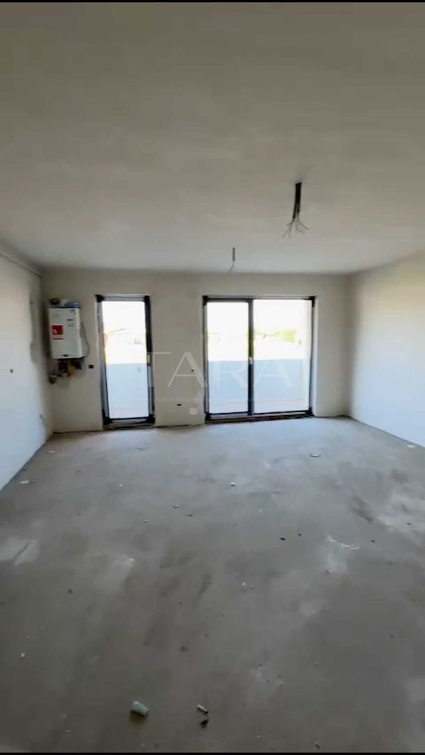 Apartament cu 2 camere, 55 mp, balcon generos și garaj subteran. - Poză 1