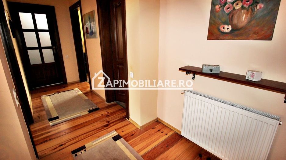 Casa 3 camere, 2 bai,1 garaj,teren 360 mp.zona Dambu Pietros - Poză 19