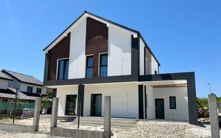 Casă single modernă, eficientă energetic și curte generoasă - Poză 1