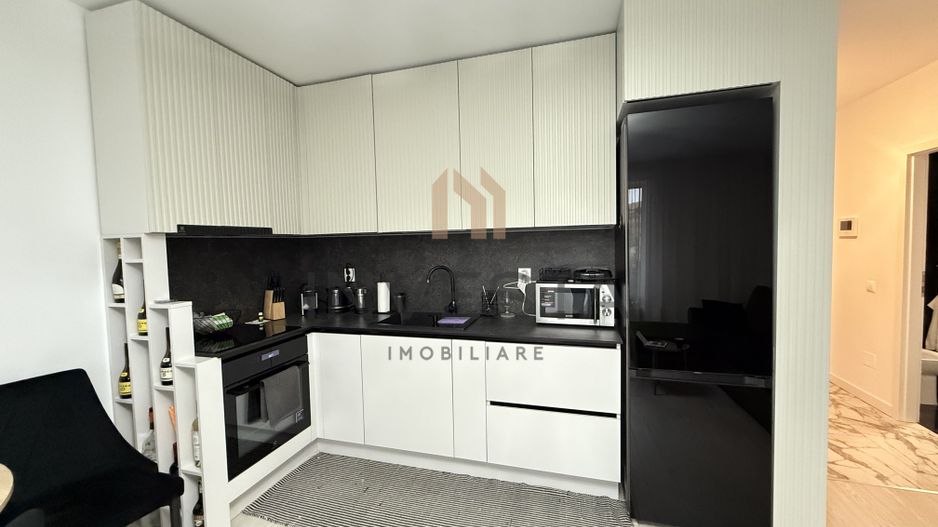 Locuință elegantă cu terasă generoasă și parcare subterană - Poză 3