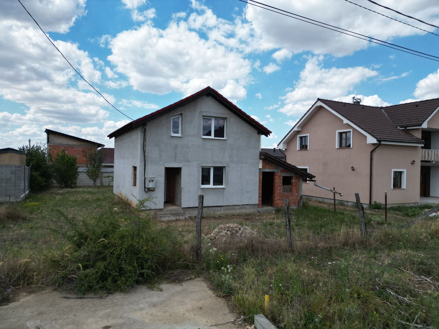 Casa la gri in Frumuseni - Poză 3