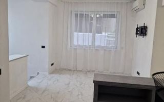 Pentru inchiriere Duplex 5 camere ( Parter + Demisol ) in vila Piata Romana - Poză 7