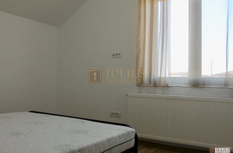 2 dormitoare, 80 mp utili, gradina si curte proprie de 300mp. - Poză 11