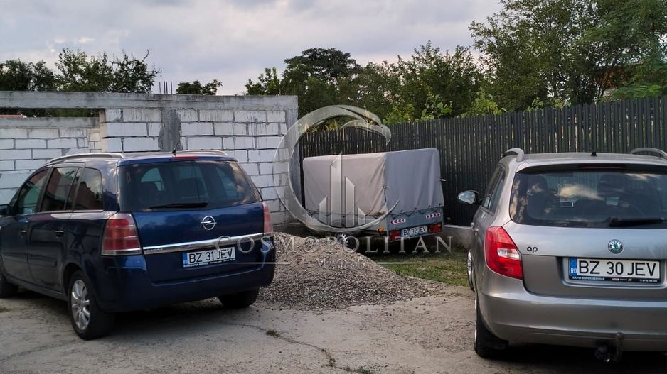 Casa si teren 970mp in comuna Costesti/BZ ~ constructie 2013 - Poză 36