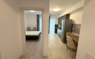 Garsonieră cu bucătărie retrasă | include parcare | Otopeni central - Poză 1