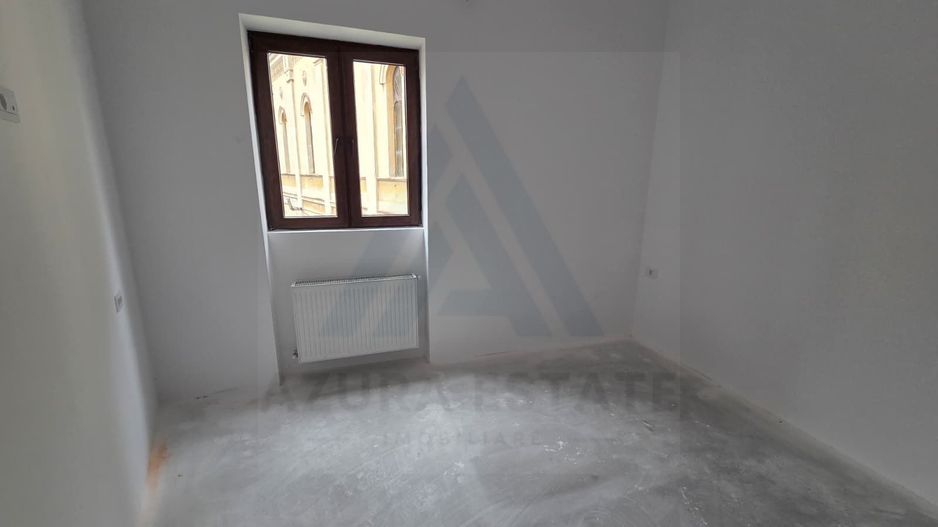 Garsonieră renovata 35 mp etaj 1 dispune de  pivnita in zona Centrala - Poză 2