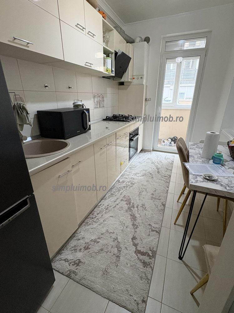 Decomandat Modern Apartament cu Balcon Spatios - Poză 3