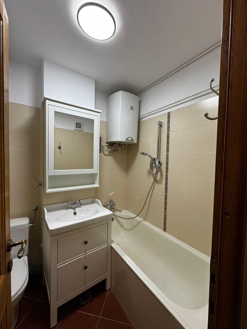Garsoniera Centrul Civic bloc de apartamente - Poză 9