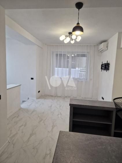 Pentru inchiriere Duplex 5 camere ( Parter + Demisol ) in vila Piata Romana - Poză 7