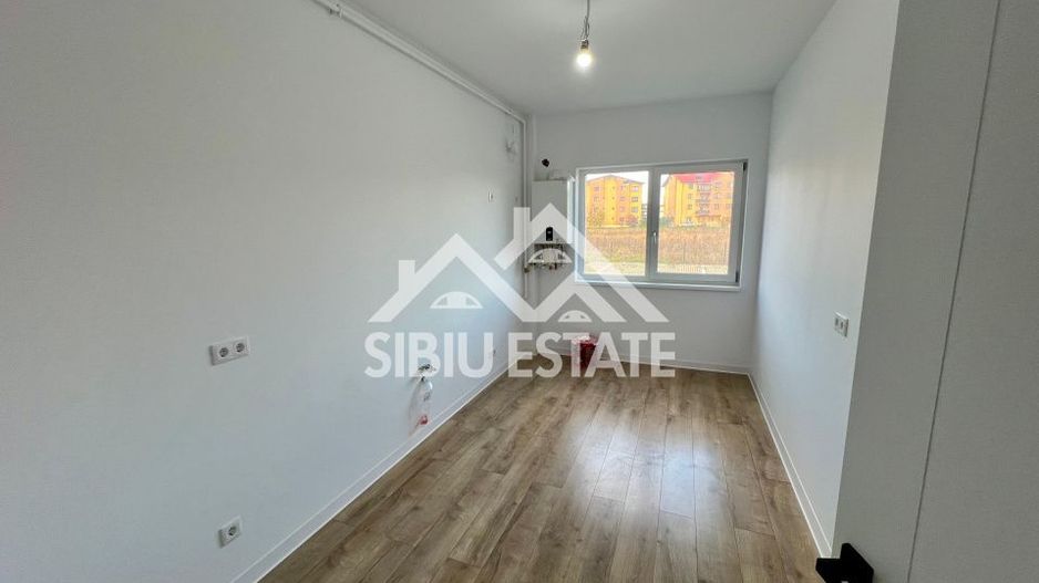 Apartament cu 3 camere, 2 bai, boxa 20 mp. loc de parcare -Finisat la cheie - Poză 3
