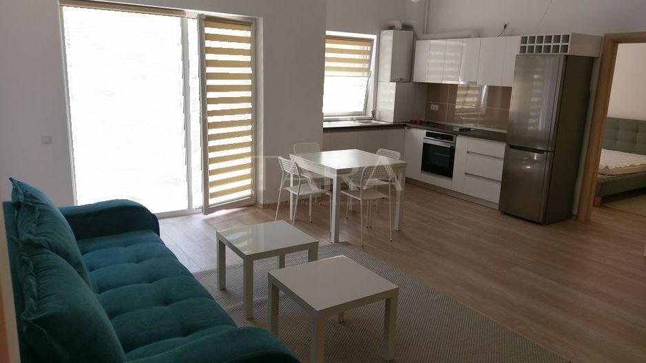 Apartament, curte privată, parcare subterană, zona Platinia. - Poză 1