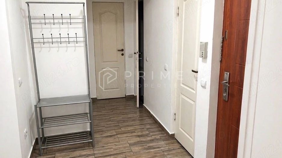 Apartament cu 2 camere, parter înalt - Poză 2