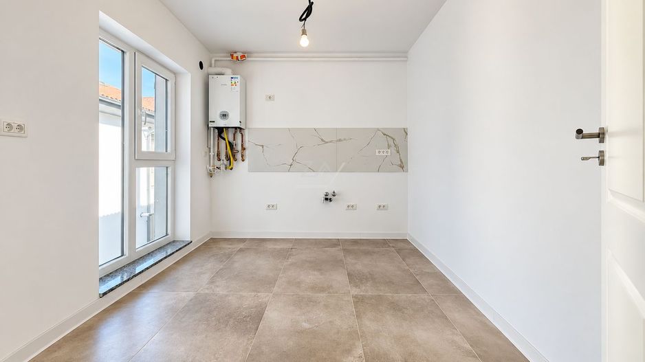 Bloc finalizat. Decomandat. Parcare acoperita. 2 balcoane. Spatiu pod. - Poză 2