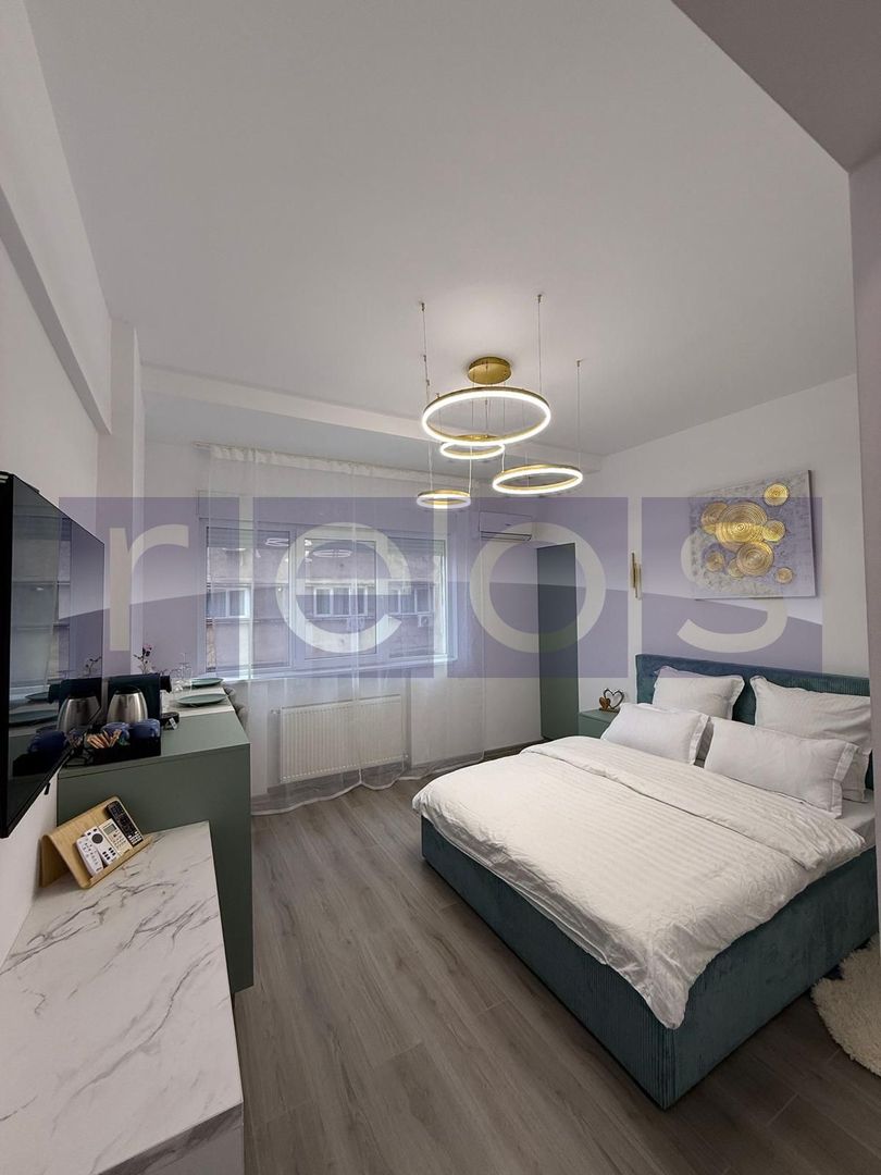 VANZARE GARSONIERA ULTRACENTRAL UNIVERSITATE 21MP RENOVAT INVESTITIE AIRBNB - Poză 1