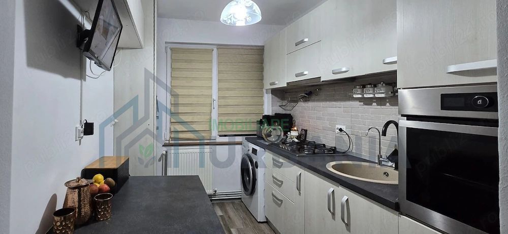 Apartament modern, 2 camere, renovat integral, în centrul orașului Pașcani - Poză 3