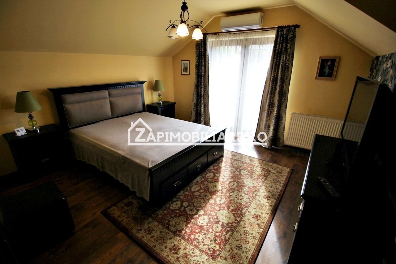 Casa 3 camere, 2 bai,1 garaj,teren 360 mp.zona Dambu Pietros - Poză 4
