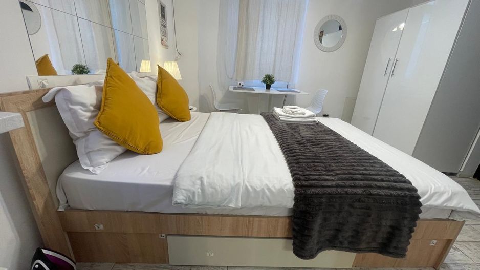 STUDIO DE ÎNCHIRIAT – ZONA Unirii -CENTRALA PROPRIE - Poză 8