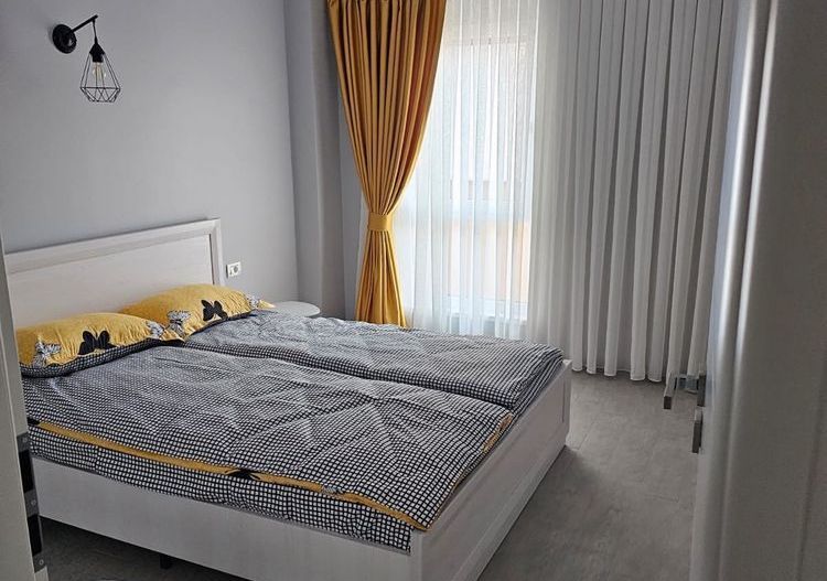 Apartament cu două camere de închiriat - Poză 1
