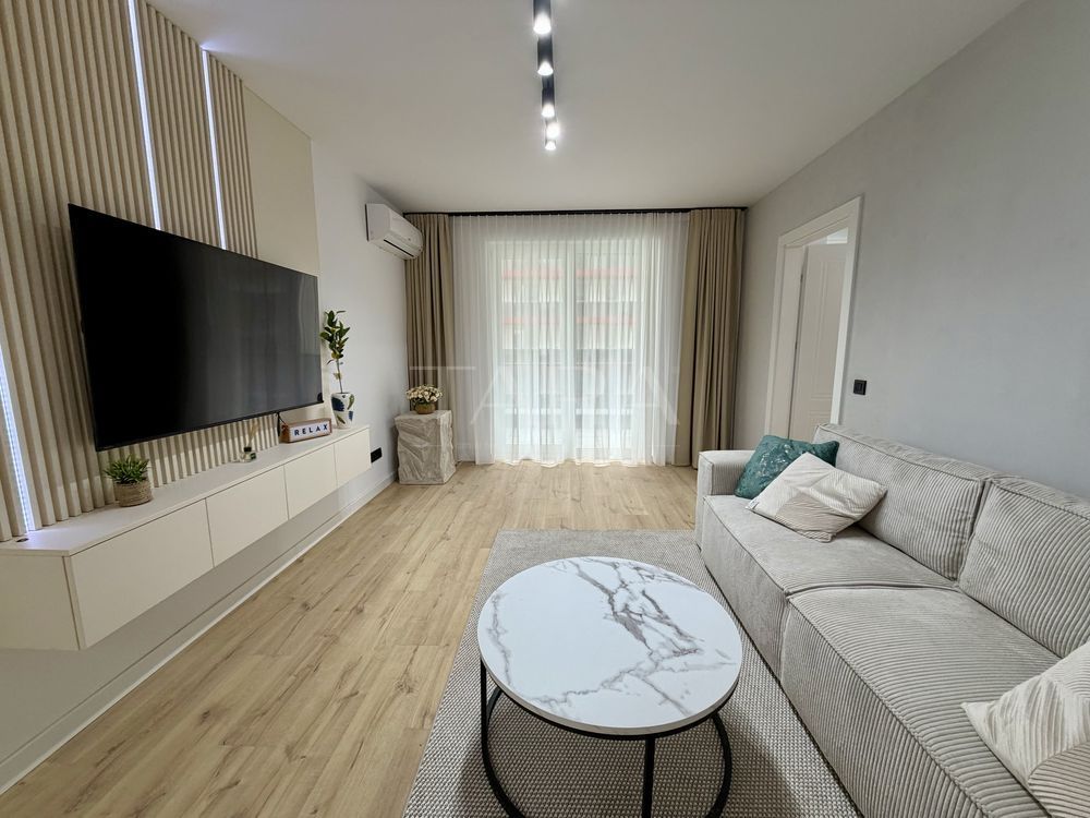 Apartament modern, finisat premium, balcon mare, mobilat complet. - Poză 1