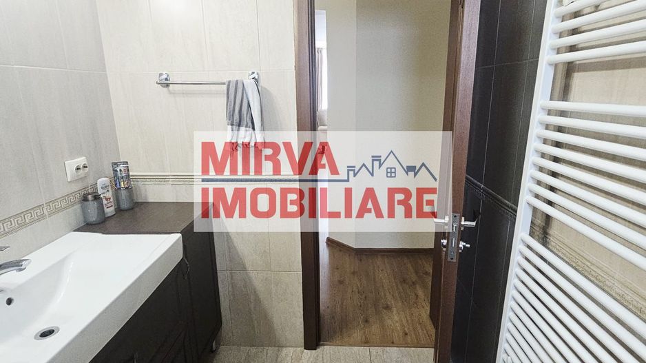 Vilă spațioasă Strejnicu S+P+1E+M, 8 camere, garaj, teren 595 mp - Poză 41