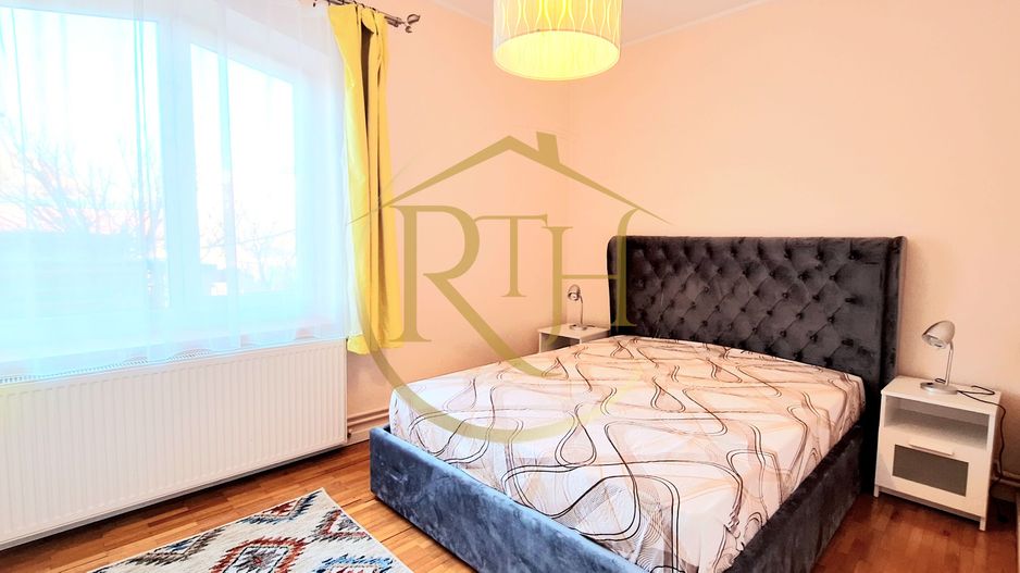 Oferim spre inchiriere un apartament cu 3 camere,modern, zona Spitalul Judetean - Poză 11