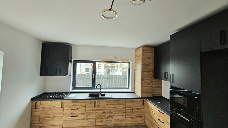 Casa 4 camere | 3 bai | centrul comunei Berceni - Poză 5