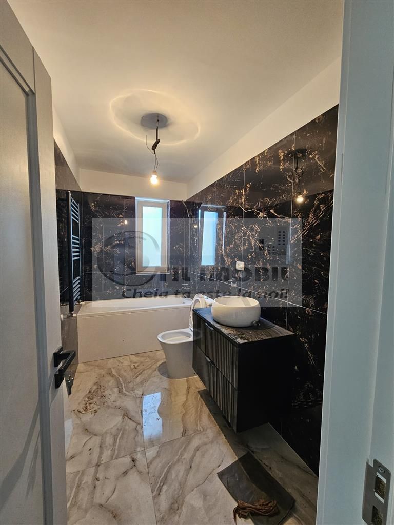 Apartament exclusivist dispus P+1E + curte 70mp - Poză 8