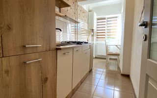 Garsoniera in Mioveni, zona centrala  situata la etajul 2 din 4 - Poză 4