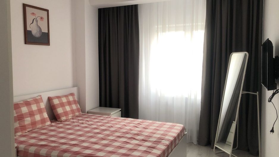 Inchiriez apartament 2 camere + parcare. Bloc nou. Sector 4 - Poză 4