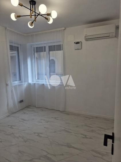 Pentru inchiriere Duplex 5 camere ( Parter + Demisol ) in vila Piata Romana - Poză 5