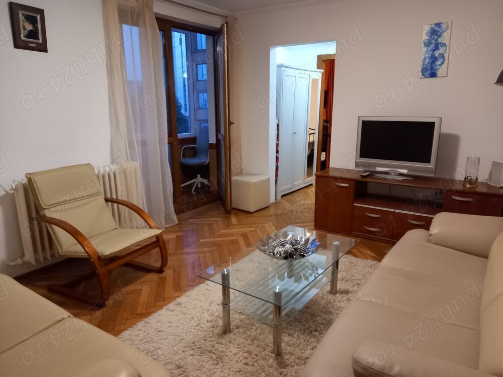 APARTAMENT  COCHET PIATA ROMANA-METROU - Poză 1