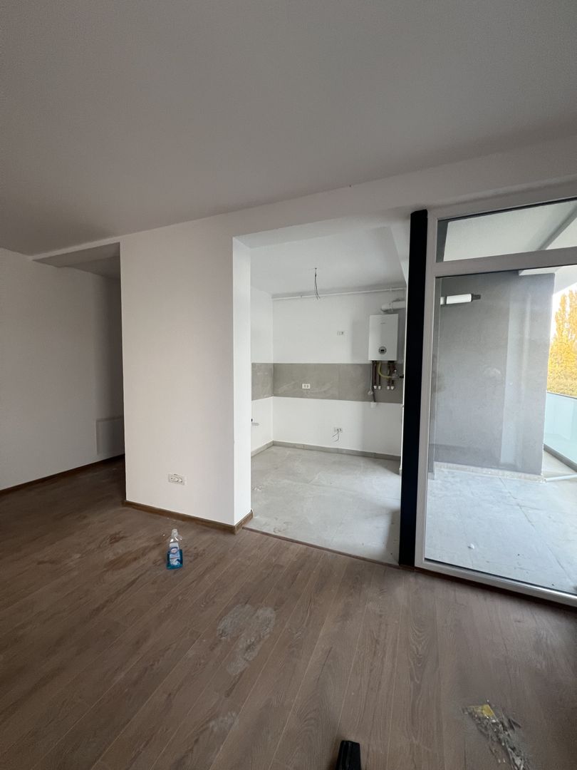 Apartament 2 cam bloc nou zona Selgros - Poză 1