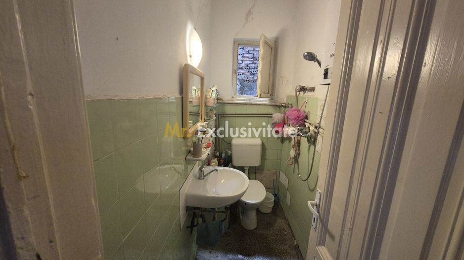Apartament cu potențial situat pe strada Amzei. - Poză 10