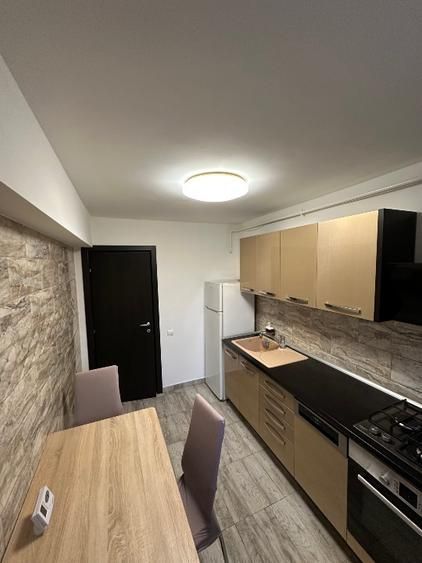 De închiriat apartament 2 camere - Poză 1