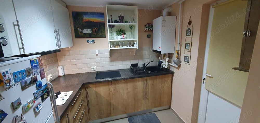 Închiriez garsonieră la casă,  Unirii, centrală proprie - Poză 4