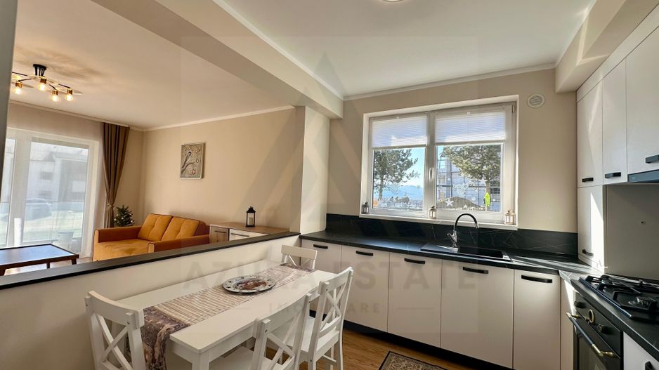 Apartament ultrafinisat 2 camere balcon 7.5 mp si parcare in Cristian - Poză 1