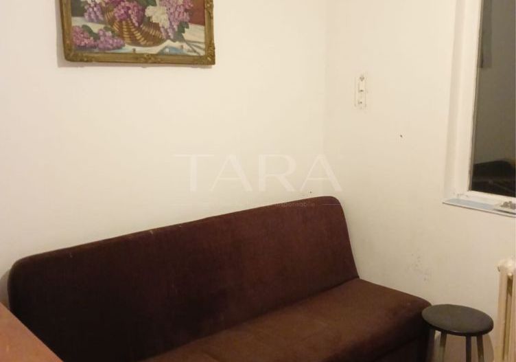 Garsonieră de vânzare,  etaj 2, baie proprie, zonă liniștită. - Poză 1