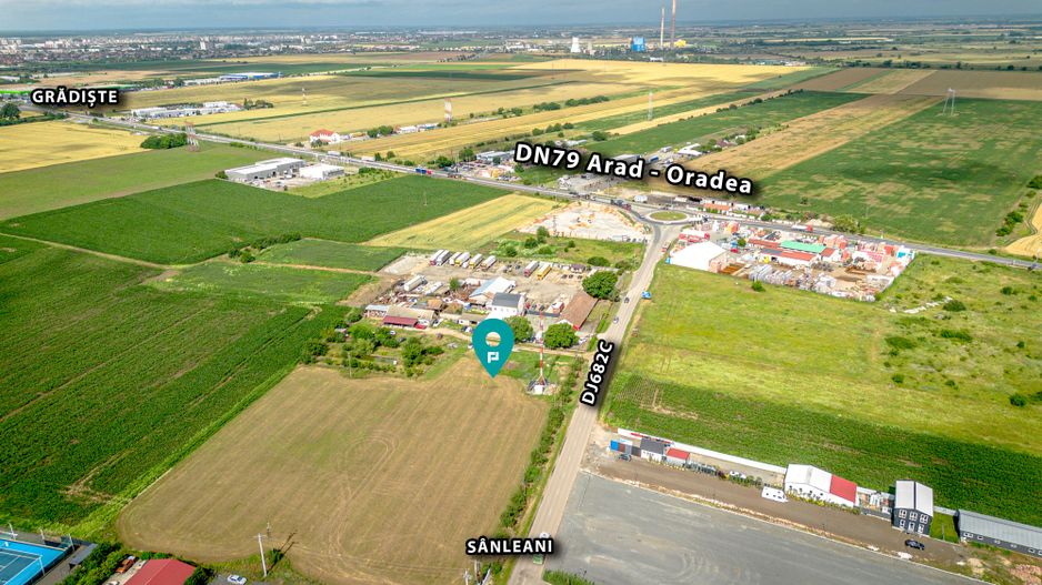 Teren intravilan 9800 mp și construcții 500 mp - Poză 1