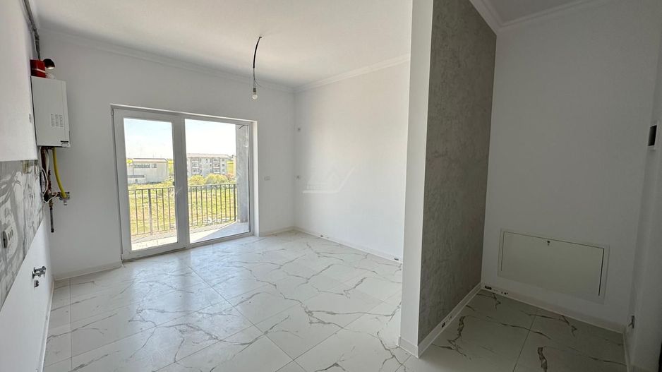 Bloc la asfalt. Etaj 1. Loc de parcare. - Poză 1