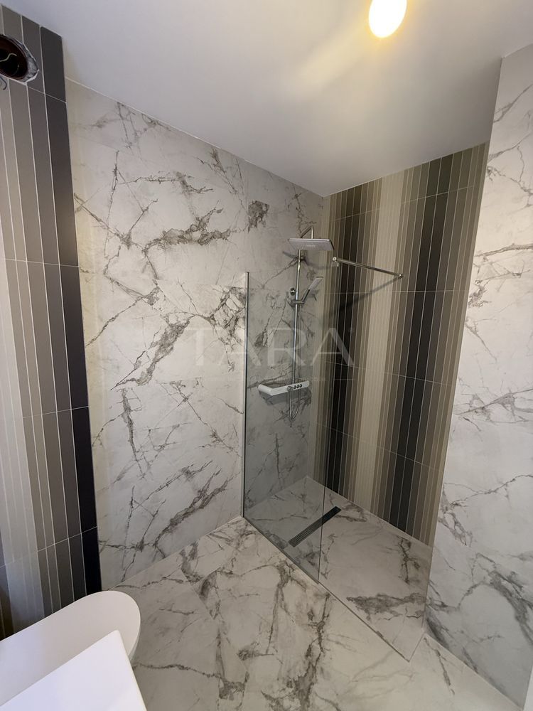 Apartament cu 2 camere, finisat modern, central Floresti. - Poză 4