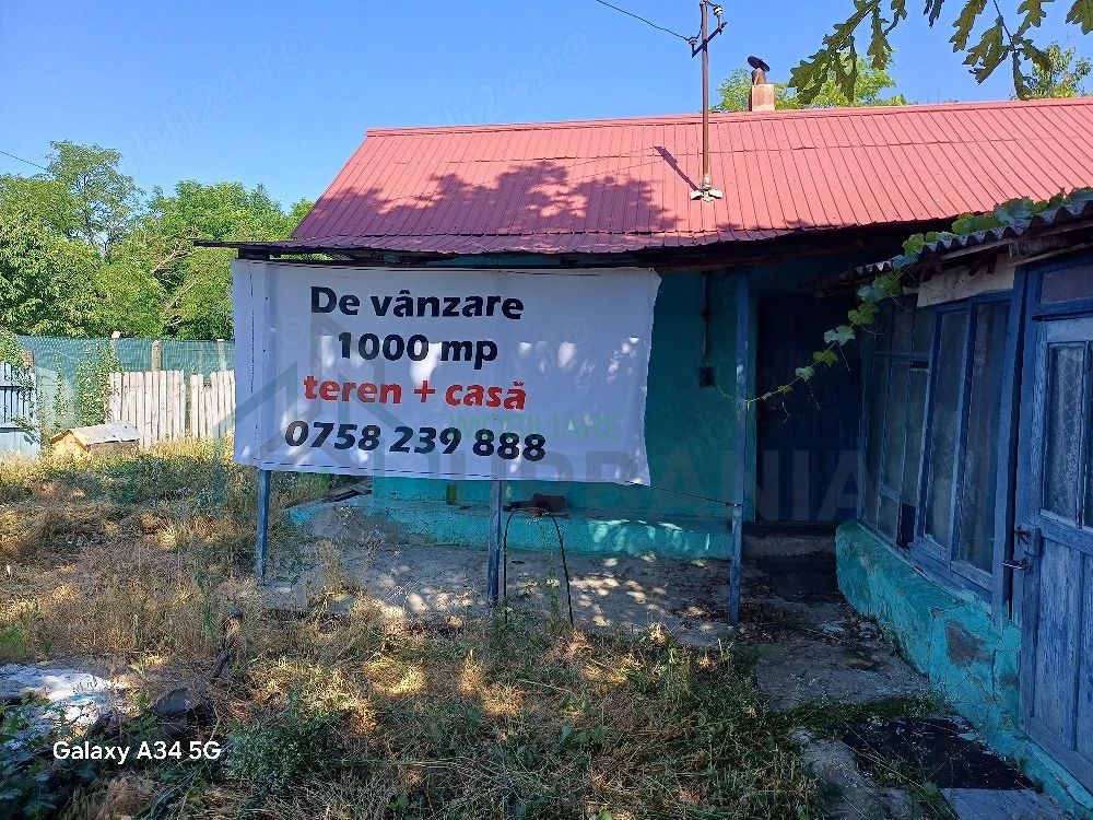 Teren intravilan 1067 mp cu casă și anexe – Grozești - Poză 1
